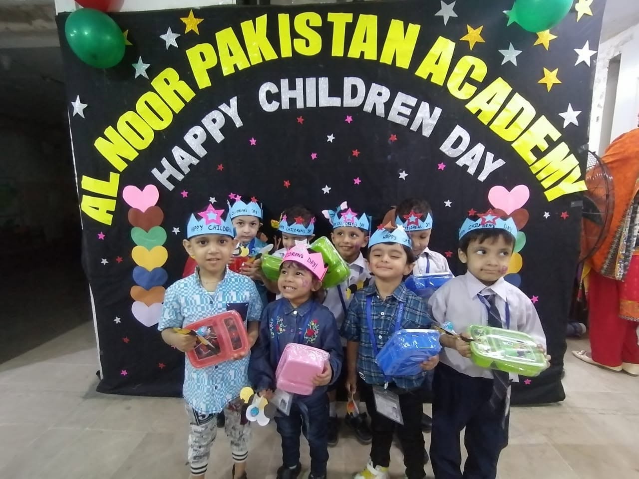 Young boys with lunchboxes