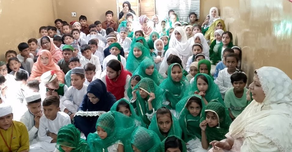 Girls gathering for religious assembly